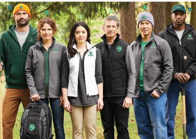 Group of people wearing company apparel